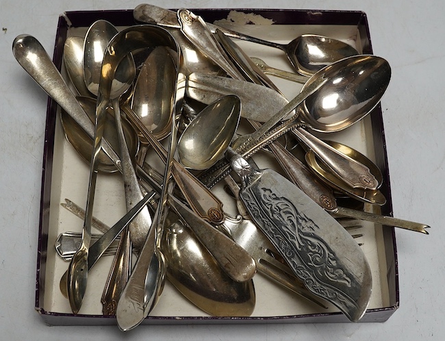 A group of odd silver flatware teaspoons, butter knives and lobster picks, 18th to 20th century, 527g. Condition - fair